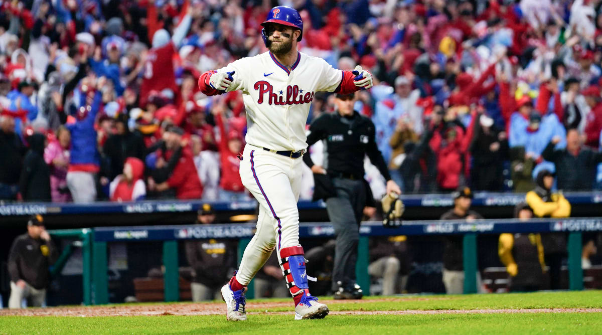 Bryce Harper celebrates hitting a home run for the Philadelphia Phillies.