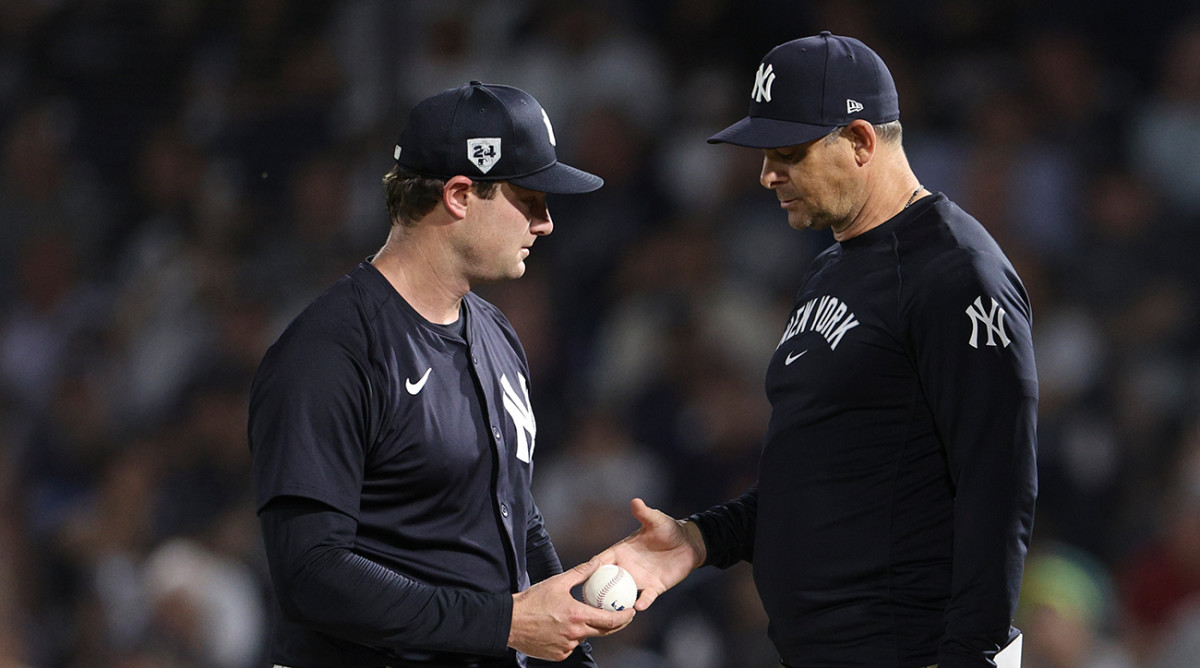 New York Yankees Manager Aaron Boone removes Gerrit Cole from a Spring Training game.