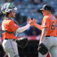 Yainer Diaz and Brandon Bielak high five after a Houston Astros win.